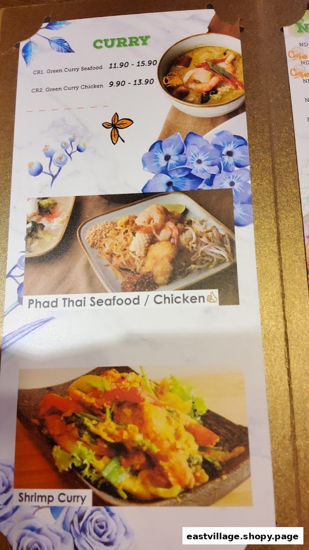 A menu page from GreaThai showcasing Thai curry, Phad Thai, and shrimp curry dishes.