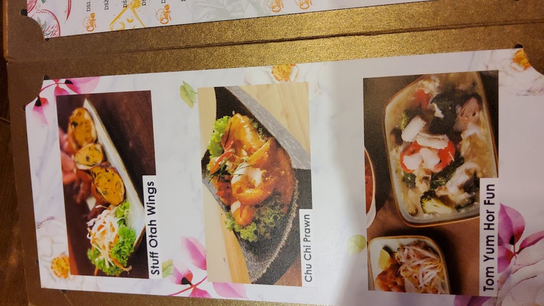 A menu page displaying delicious Thai dishes: Stuff Otah Wings, Chu Chi Prawn, and Tom Yum Hor Fun.