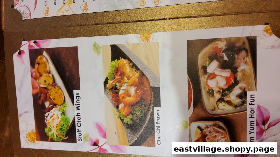 A menu page displaying delicious Thai dishes: Stuff Otah Wings, Chu Chi Prawn, and Tom Yum Hor Fun.