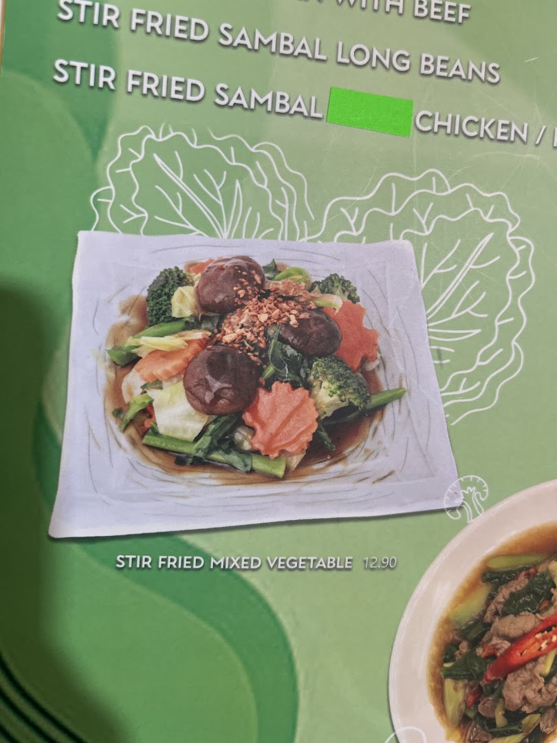 Close-up of GreaThai's menu featuring a vibrant stir-fried mixed vegetable dish and other Thai specialties.