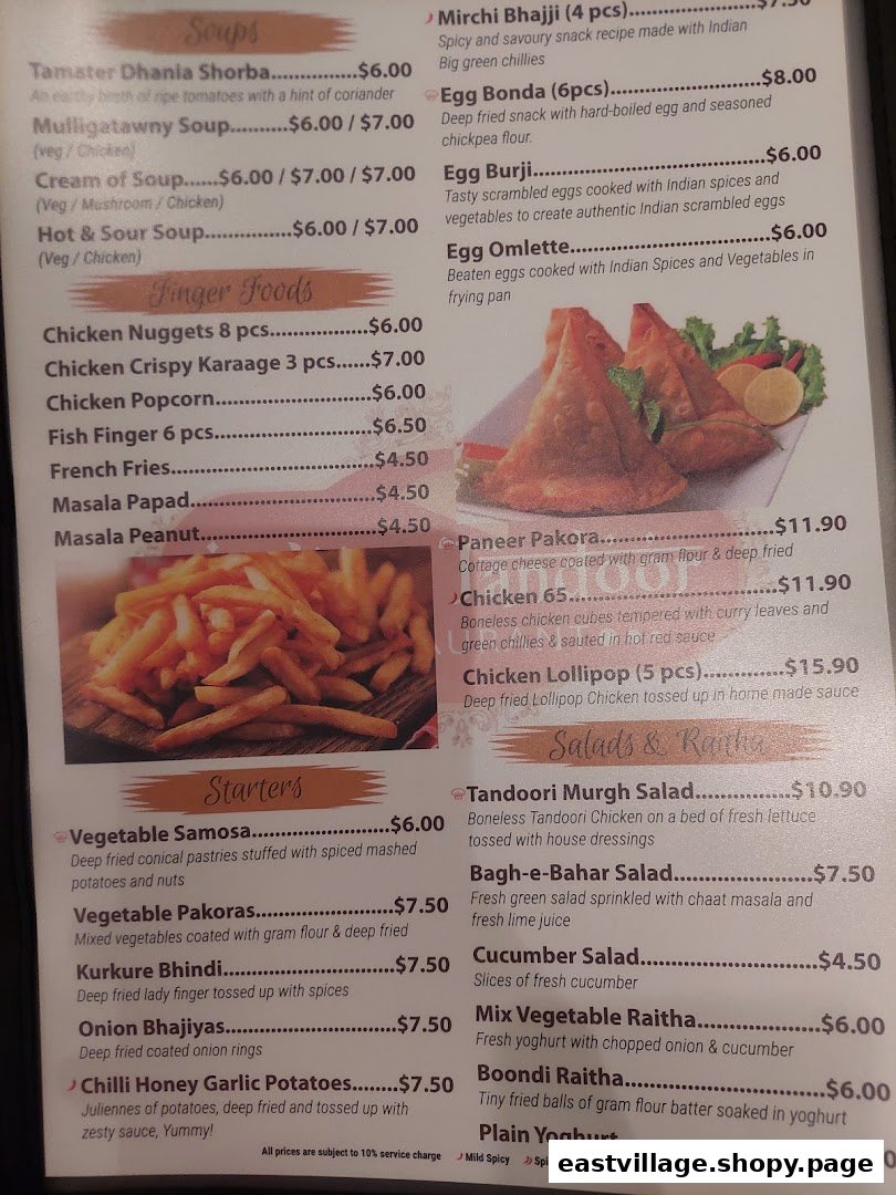 A detailed menu displaying a variety of Indian soups, finger foods, starters, salads, and other dishes.