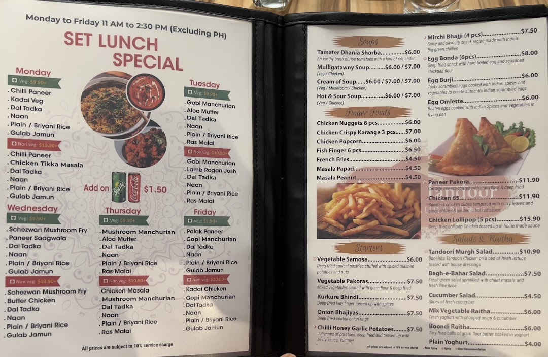A comprehensive menu displaying daily set lunch specials, soups, appetizers, and salads with prices.