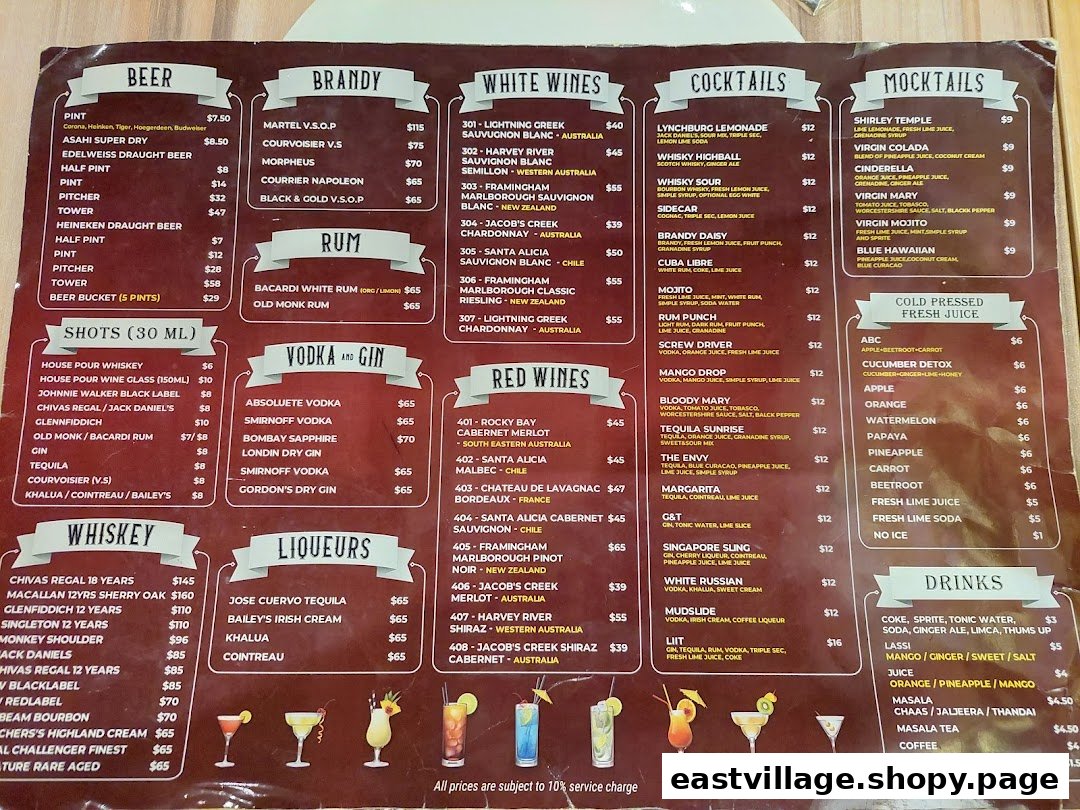 A comprehensive menu displaying a wide variety of alcoholic and non-alcoholic beverages, including cocktails, wines, and fresh juices.