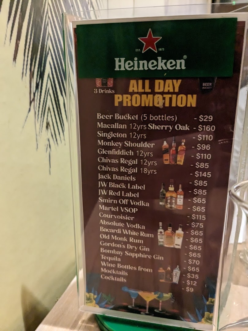A menu display board showcasing an 'All Day Promotion' for various alcoholic and non-alcoholic beverages.