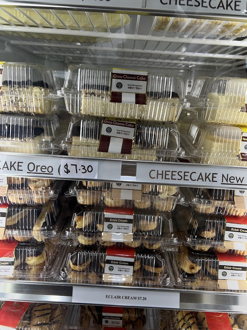 Various packaged desserts, including Oreo Cheesecake and Eclair Cream, displayed in a refrigerated case.