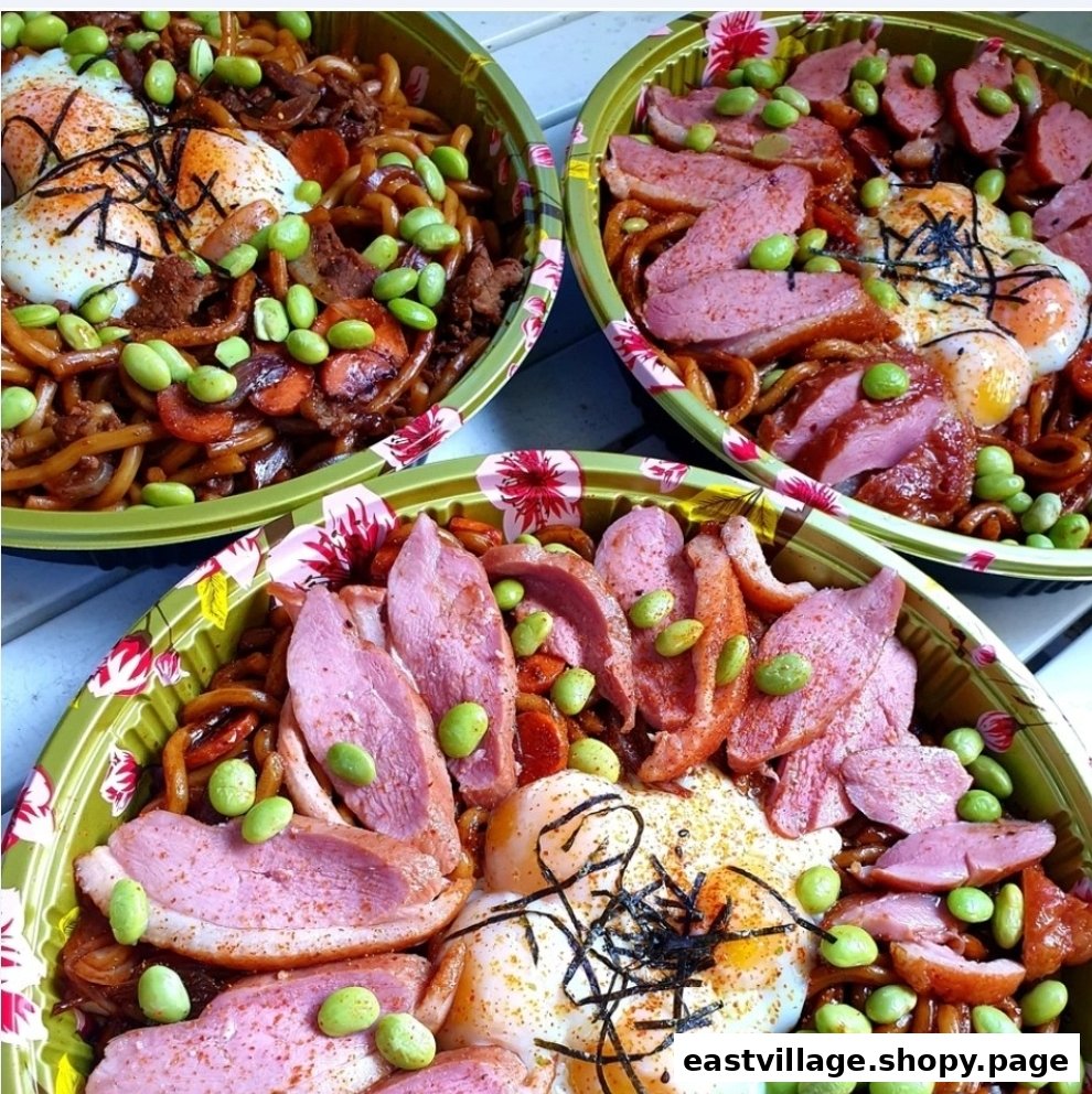 Three bowls of delicious noodles topped with sliced meat, fried eggs, and edamame beans.