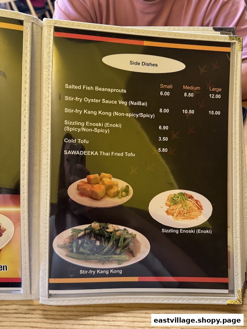 A close-up of a menu page featuring various side dishes with prices and images.