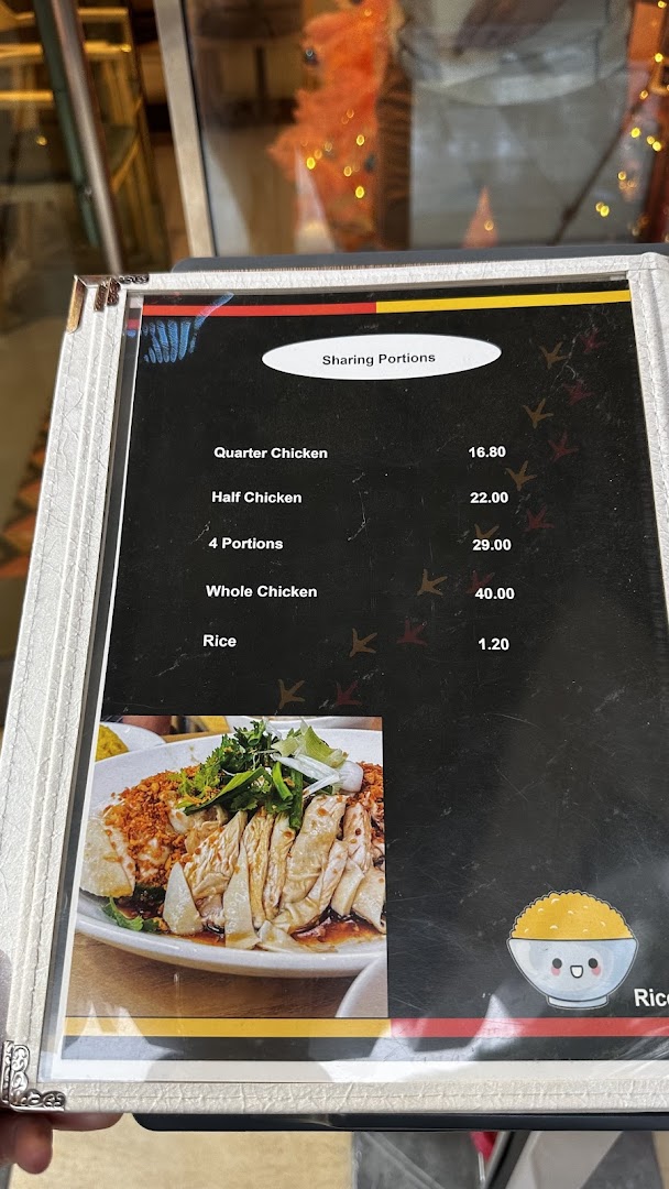 A menu displaying sharing portions of chicken and rice with prices from KTMW Katong Mei Wei.