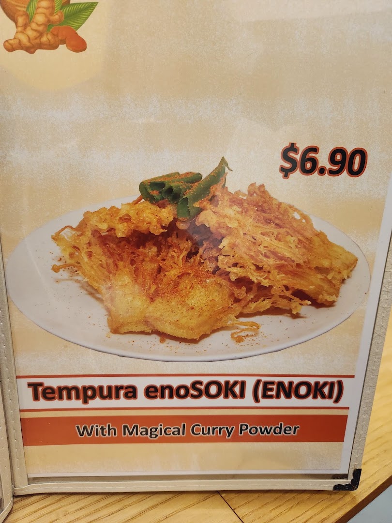 A menu display featuring crispy Tempura enoSoki (Enoki) with magical curry powder, priced at $6.90.