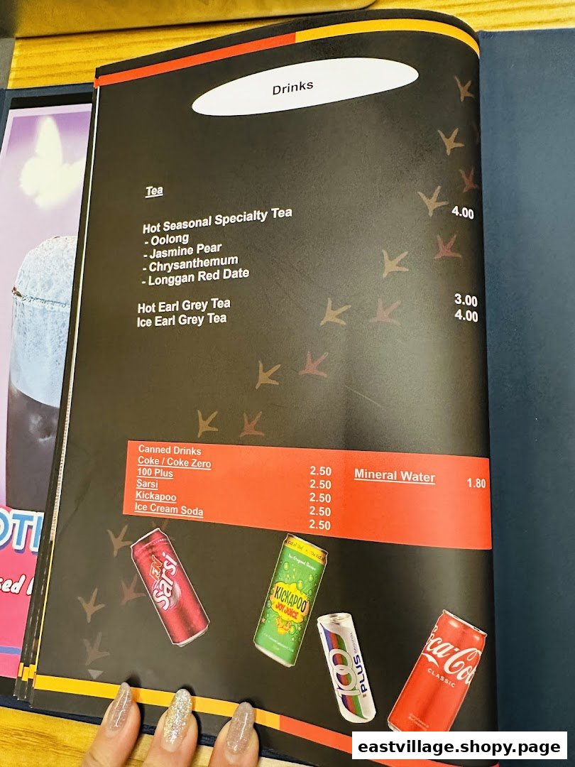 A menu page displaying various tea and canned drink options with their prices.