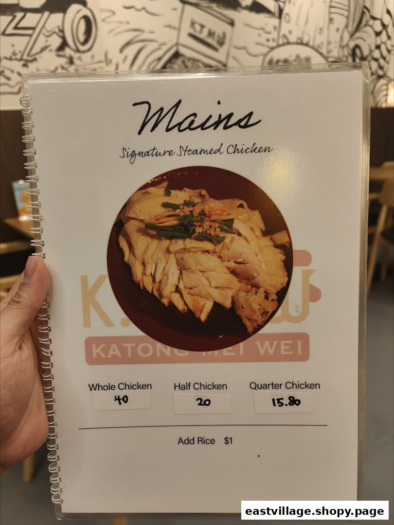 A menu page displaying Signature Steamed Chicken options and prices.