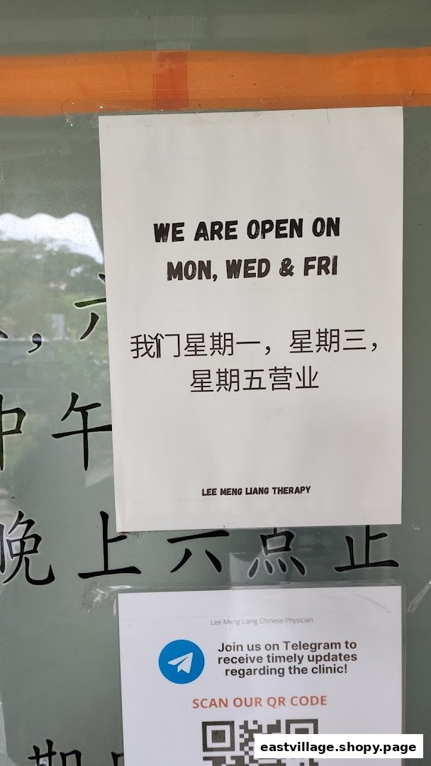Notices on a shop front detailing opening hours and a QR code for Lee Meng Liang Therapy.
