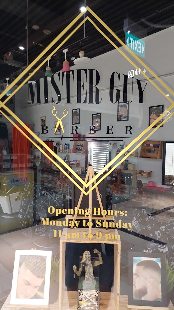 The storefront of Mister Guy Barber, featuring its logo, interior view, and operating hours.