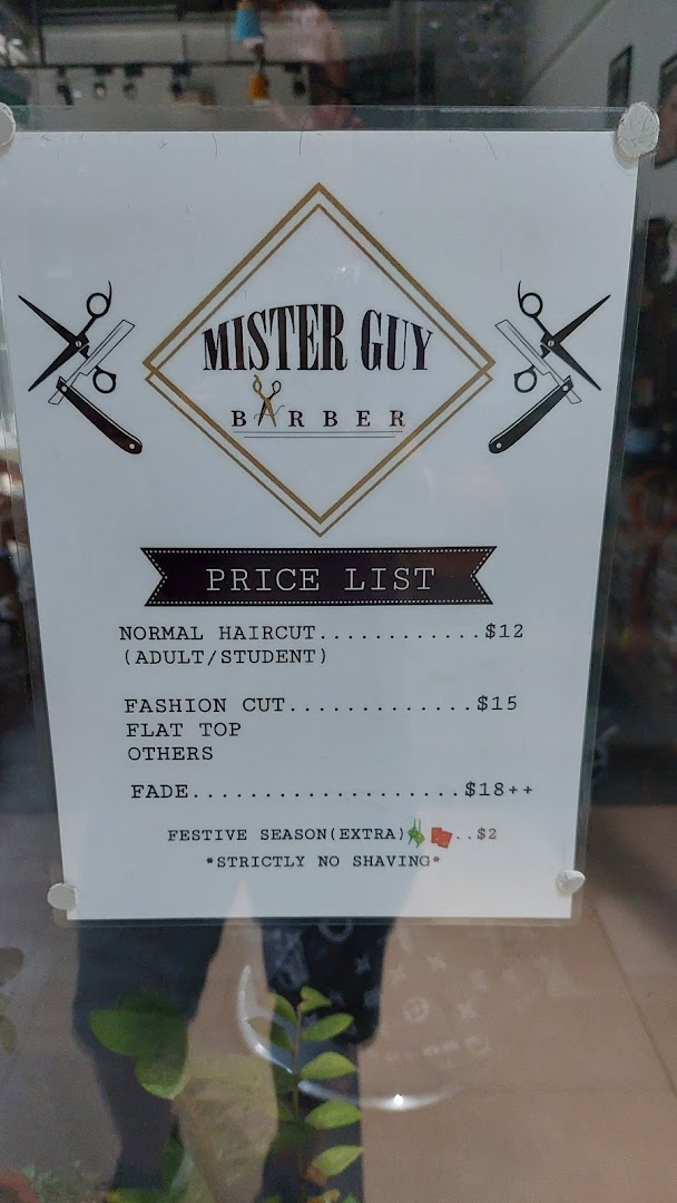 A clear price list for Mister Guy Barber, detailing various haircut services and their costs.