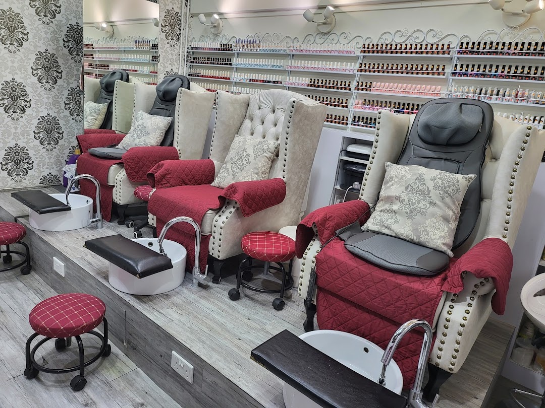 Comfortable pedicure stations with plush chairs and a wide selection of nail polishes.
