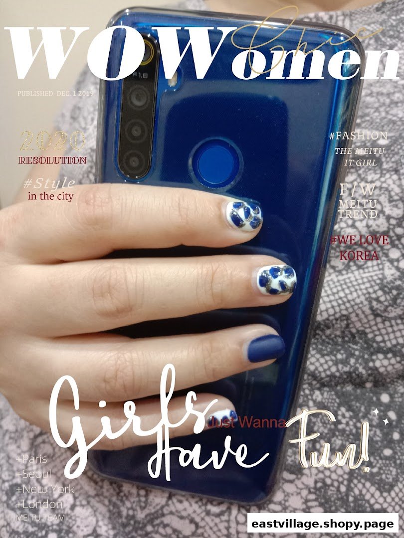 A hand with blue and white patterned nails holds a phone, with magazine-style text overlay.