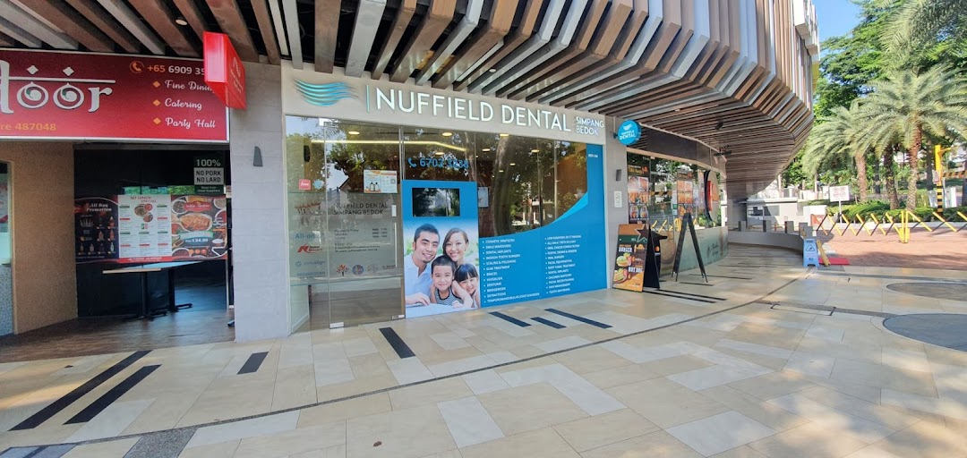 The storefront of Nuffield Dental Simpang Bedok, a modern dental clinic.