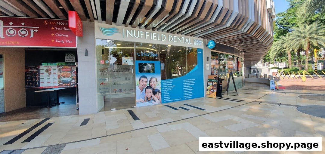 The storefront of Nuffield Dental Simpang Bedok, a modern dental clinic.
