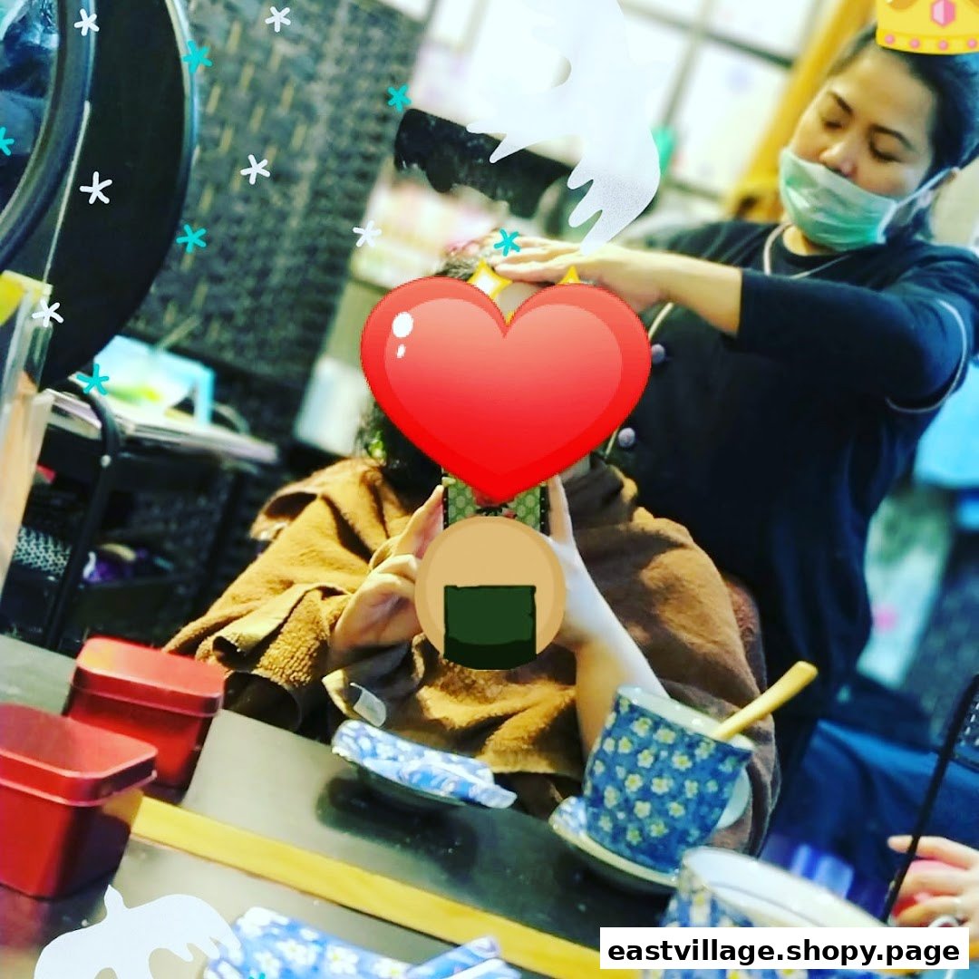 A client receives a relaxing head treatment from a masked therapist at Niki Beauty Wellness Salon.