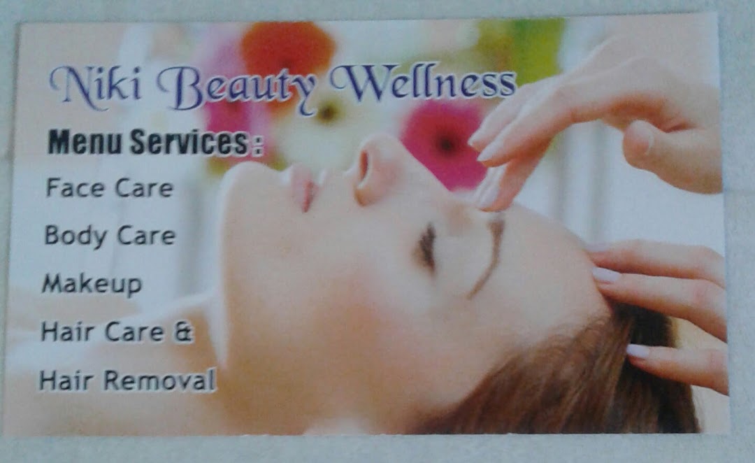 A service menu for Niki Beauty Wellness, featuring a woman receiving a beauty treatment.