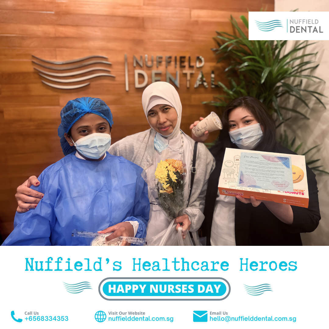 Three individuals, including Nuffield Dental staff, celebrating Nurses Day with gifts and flowers.