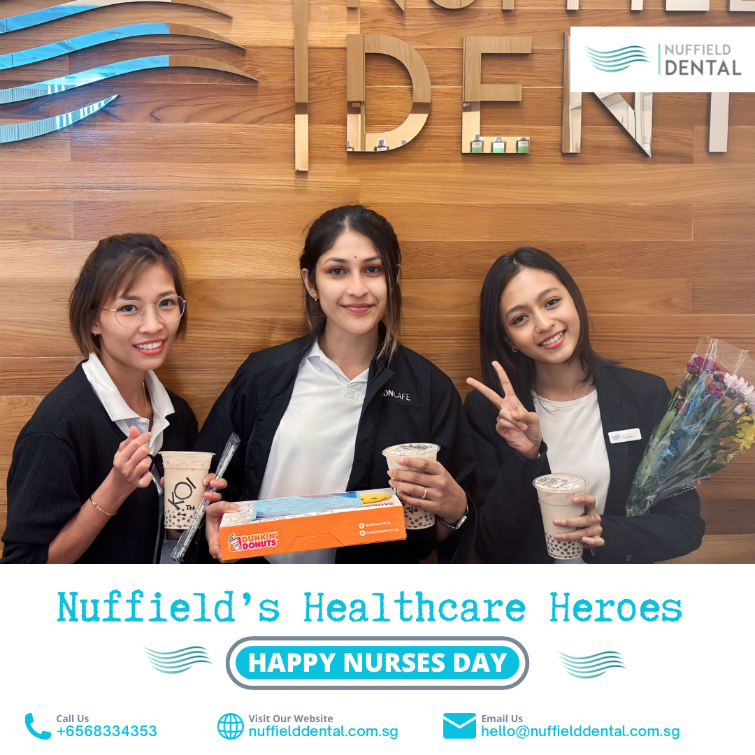 Three Nuffield Dental staff members smiling, holding drinks and a donut box, celebrating Nurses Day.