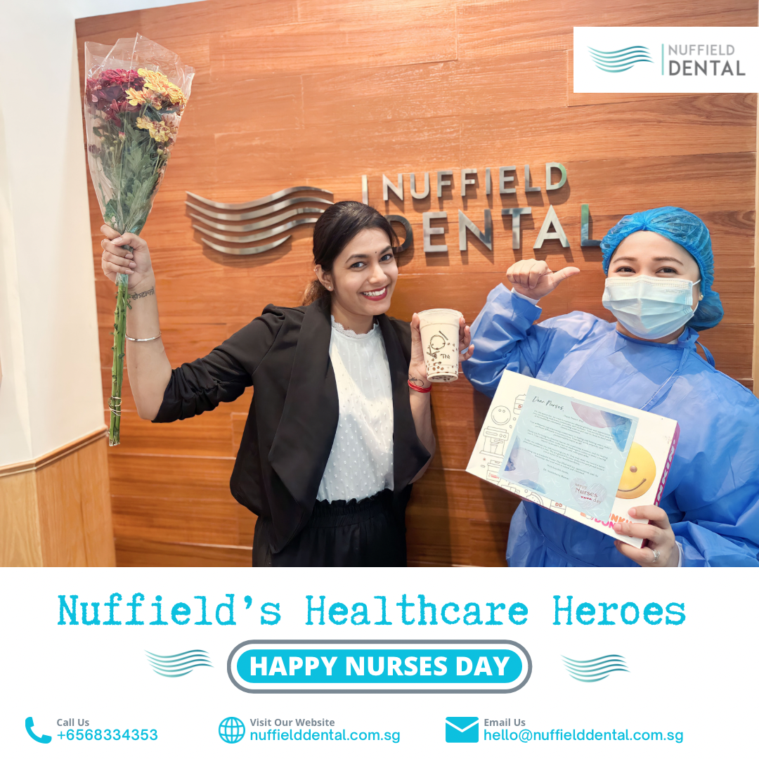 Two Nuffield Dental staff members celebrating Nurses Day with flowers and gifts.