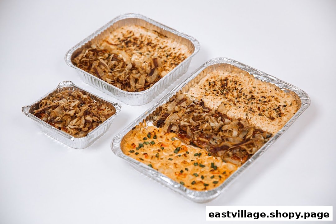 Three foil containers showcasing different delicious food preparations, likely rice dishes with various toppings.