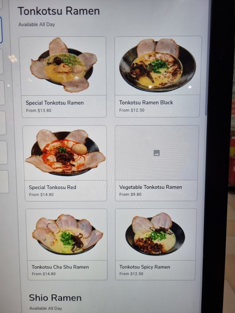 A digital menu displaying various Tonkotsu ramen dishes with their prices and images.
