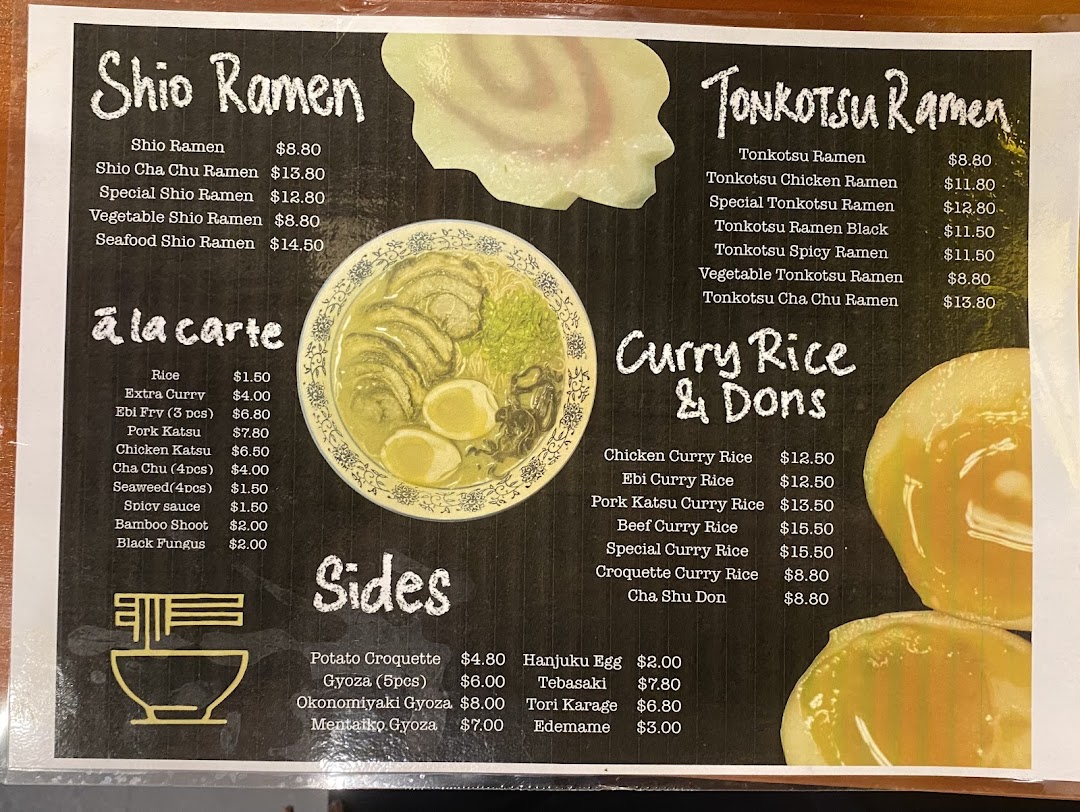 A detailed menu from Ramen-ya, showcasing various ramen, curry rice, and side dishes.