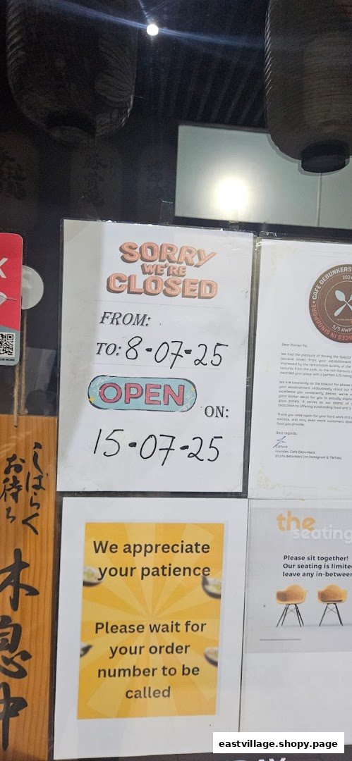 Notices on a Ramen-ya shop front, including temporary closure dates and customer instructions.