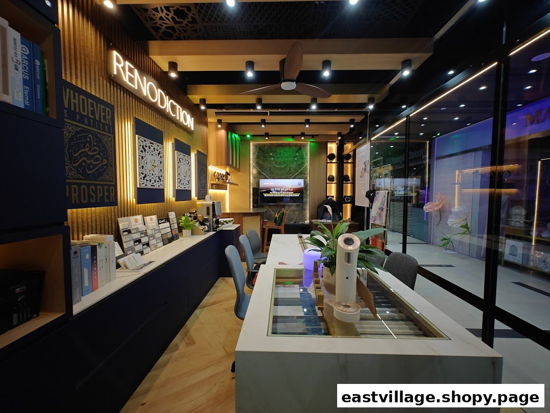 A modern and inviting interior of RENODICTION, showcasing design elements and product samples.
