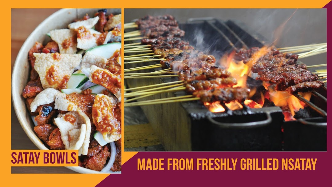 A vibrant image showcasing delicious satay bowls and skewers grilling over an open flame.
