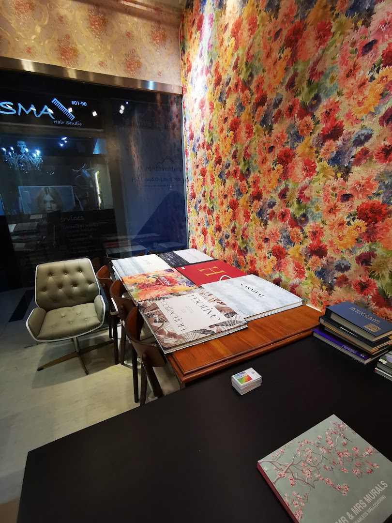 Interior view of a wallpaper and curtains gallery, showcasing vibrant floral wallpaper and design sample books.