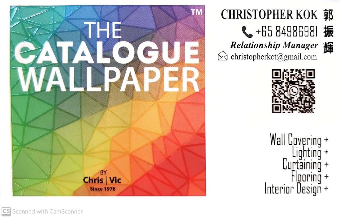 A business card for The Catalogue Wallpaper, showcasing contact details and interior design services.