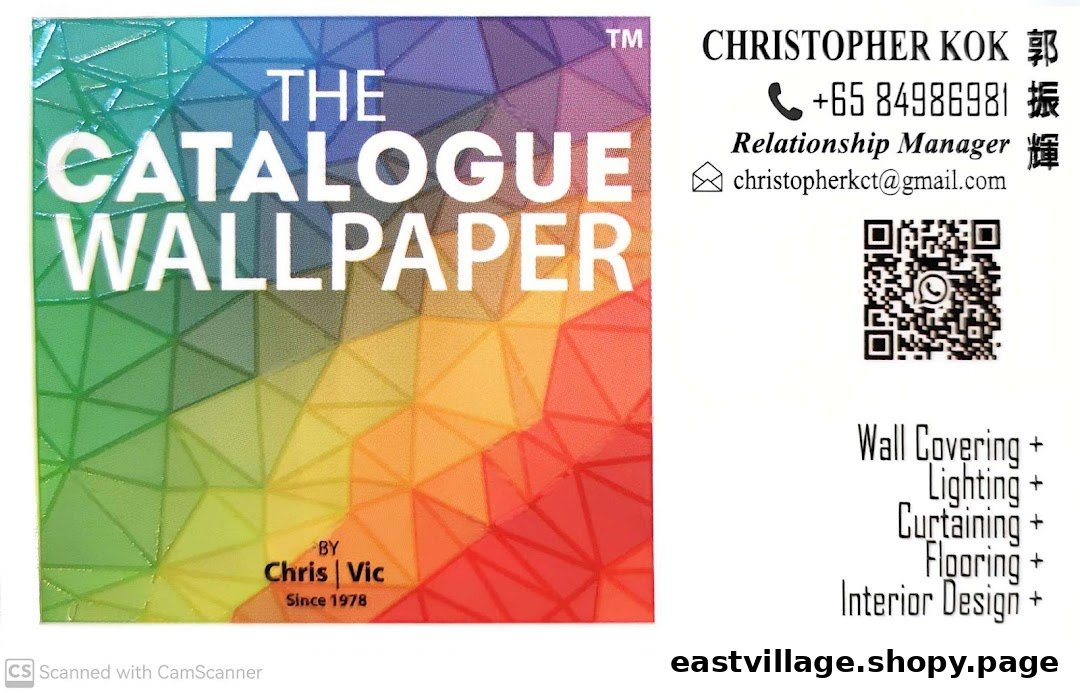 A business card for The Catalogue Wallpaper, showcasing contact details and interior design services.