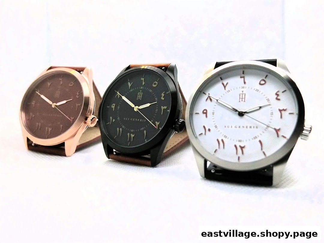 Three stylish watches with Arabic numerals on their faces are displayed, showcasing unique designs.