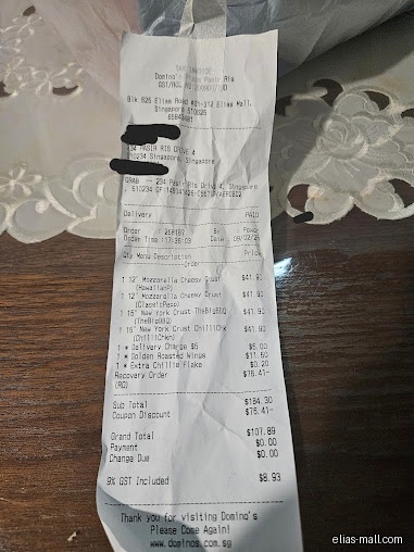 A Domino's Pizza receipt shows a list of items and the total cost.