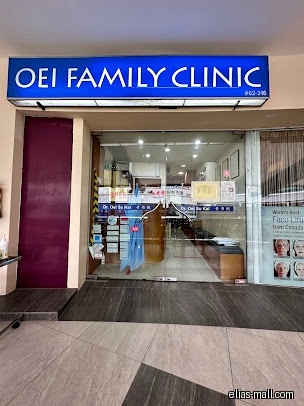 The image shows the shop front of Oei Family Clinic with glass doors.