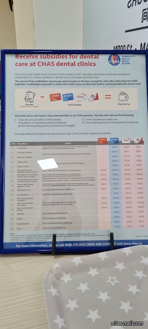 A framed CHAS dental subsidy information sheet for Elias Dental Surgery.