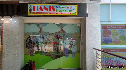 The image shows the storefront of HANIS Montessori Playhouse with colorful decorations.