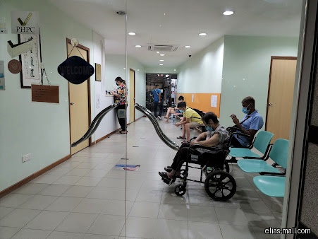 The image shows the waiting area inside K B Tan Clinic & Surgery.