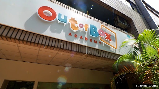 The image shows the exterior sign for Out Of Box Academy - Elias.