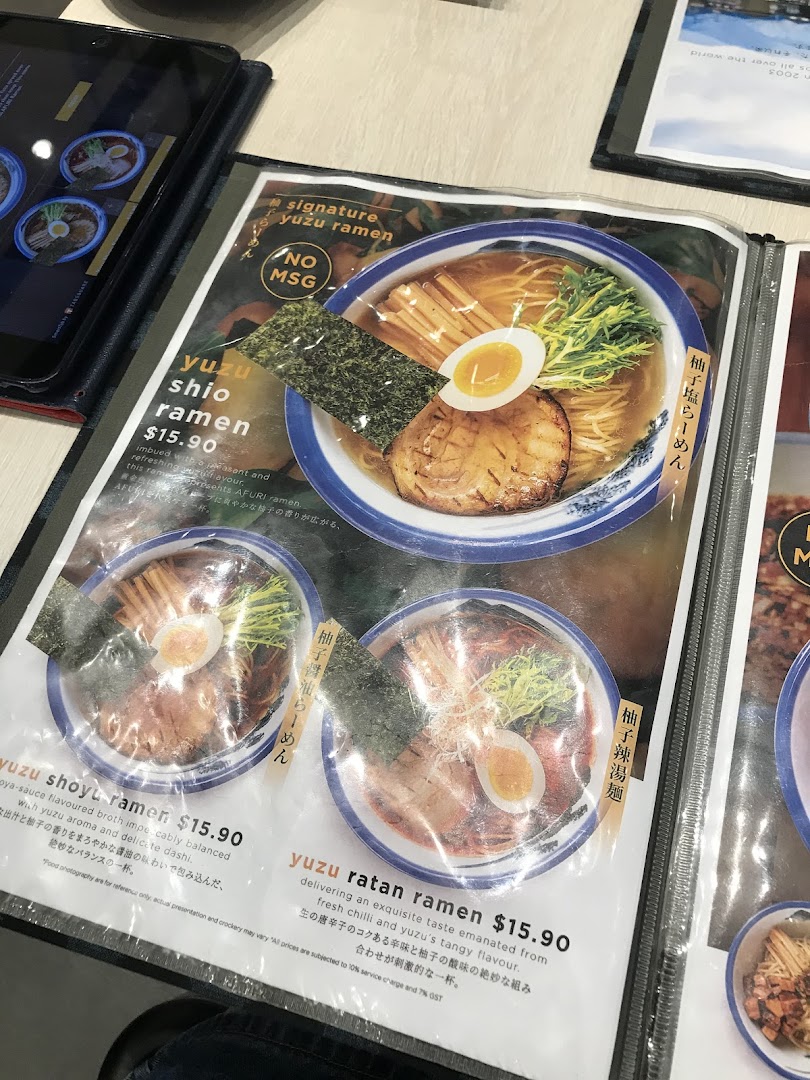 A close-up of Afuri's ramen menu, showcasing various yuzu ramen dishes with prices and descriptions.
