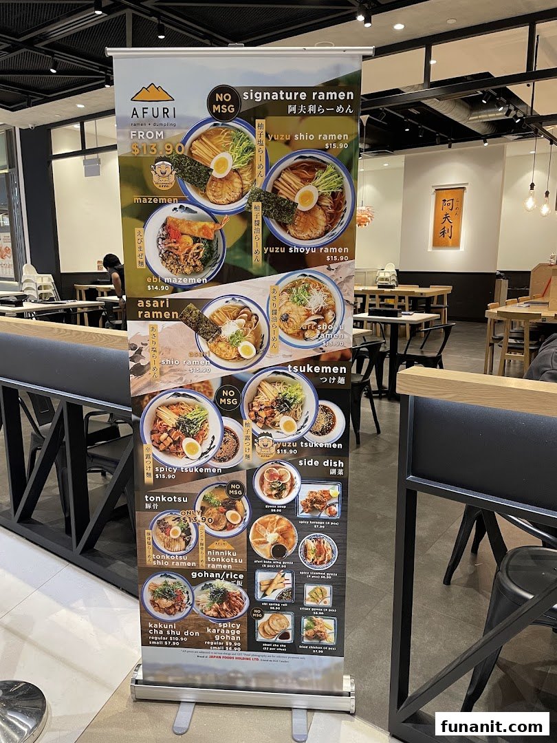 A large pull-up banner displaying Afuri's ramen and side dish menu with prices and photos.