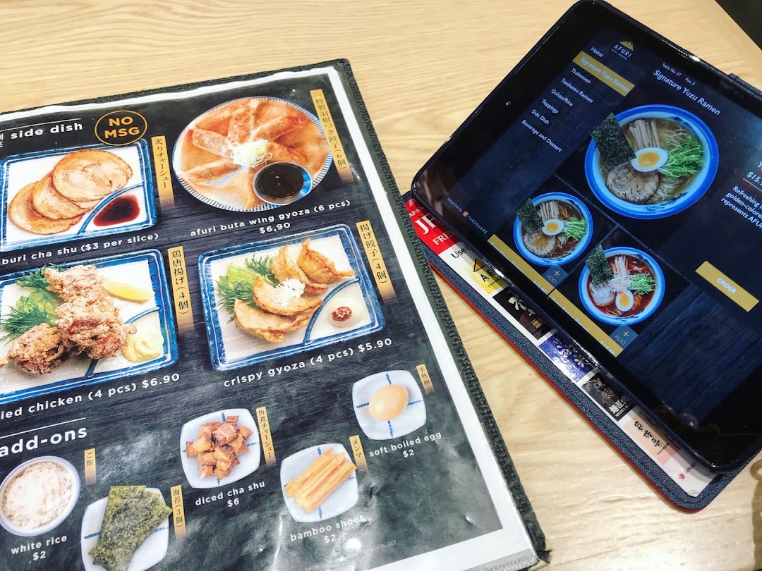 A detailed view of Afuri's physical and digital menus, showcasing ramen, side dishes, and add-ons.