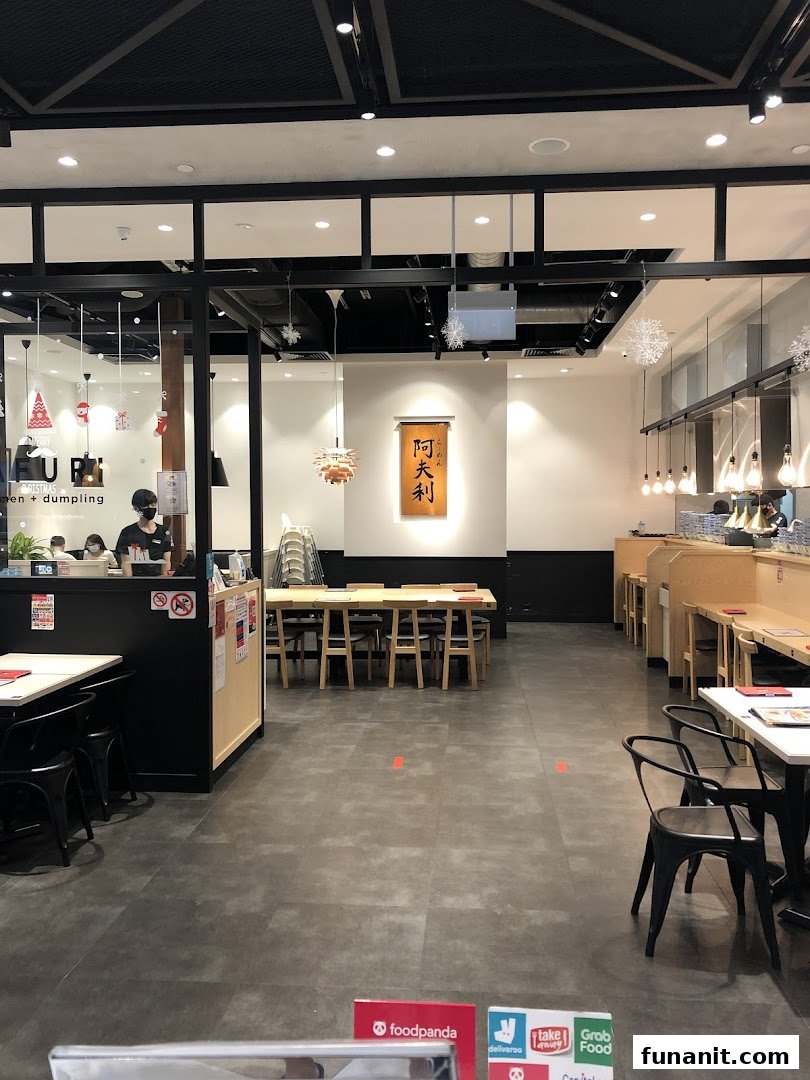 An interior view of Afuri restaurant, featuring modern decor, various seating arrangements, and a welcoming atmosphere.
