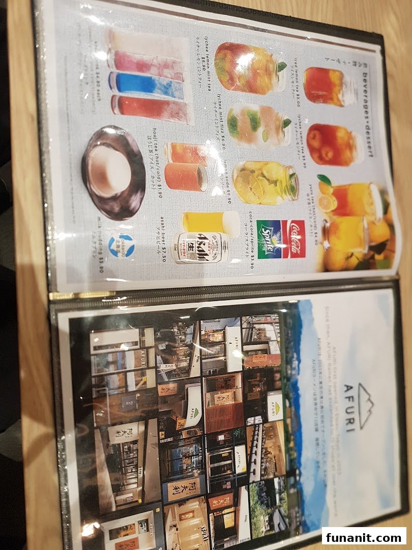 A menu page displaying Afuri's beverages and desserts, alongside a page detailing the brand's history.