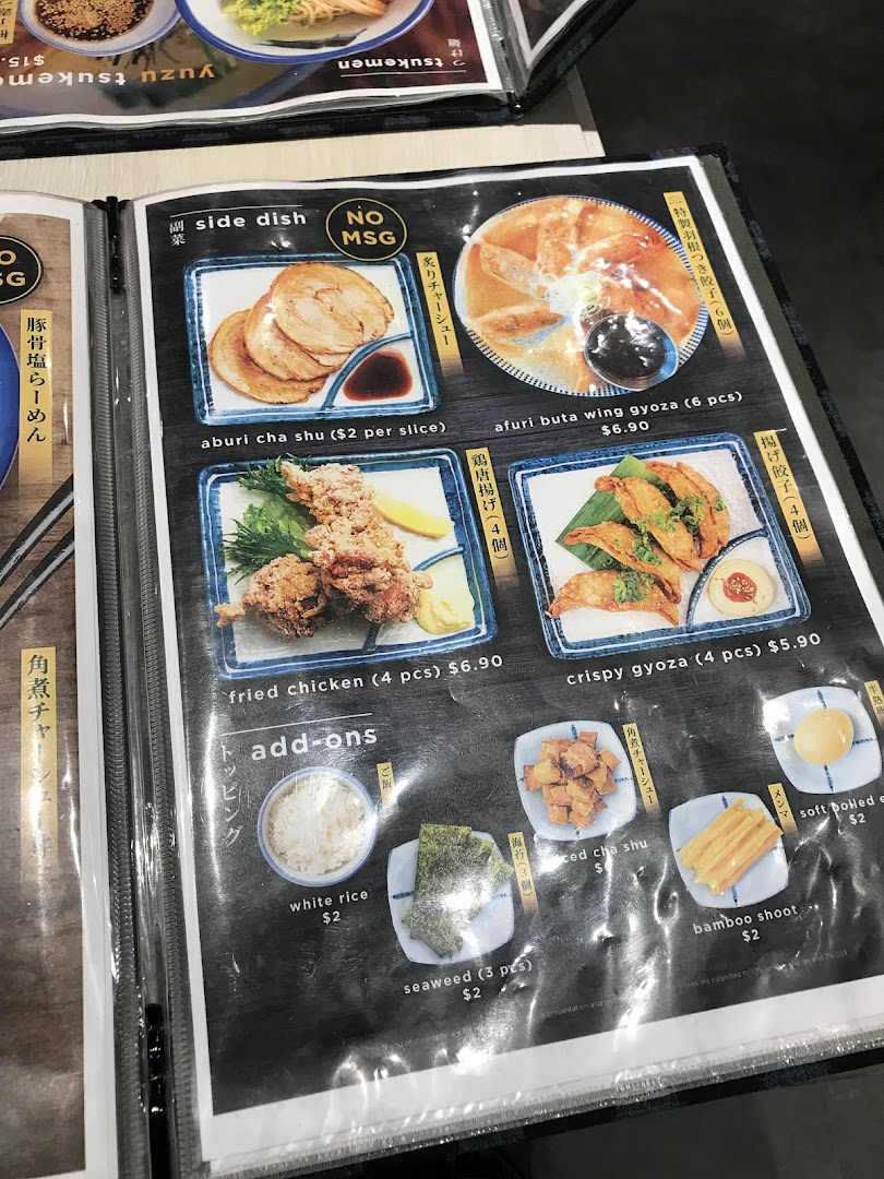 A close-up view of Afuri's menu displaying various side dishes and add-ons with prices.