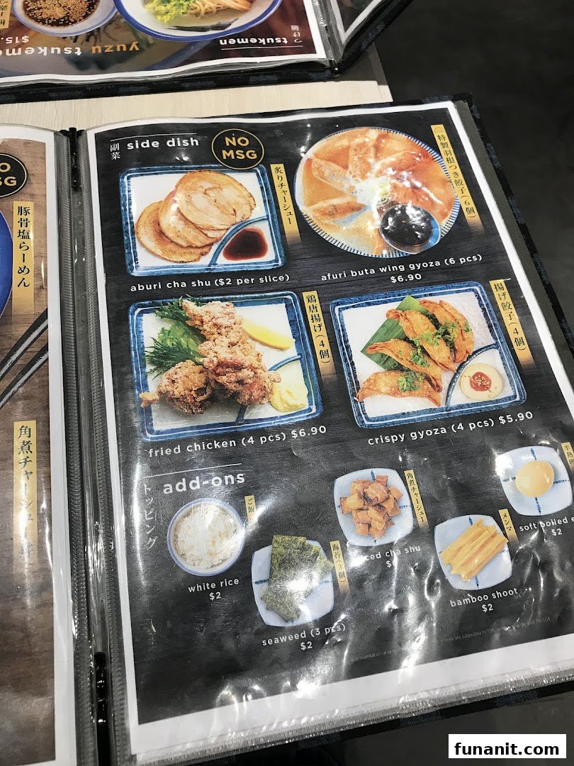 A close-up view of Afuri's menu displaying various side dishes and add-ons with prices.